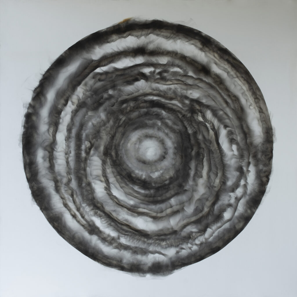 Painting showing the revolutionary art techniques of Miguel Hernandez Bastos, featuring a large circle painted in smoke on canvas.