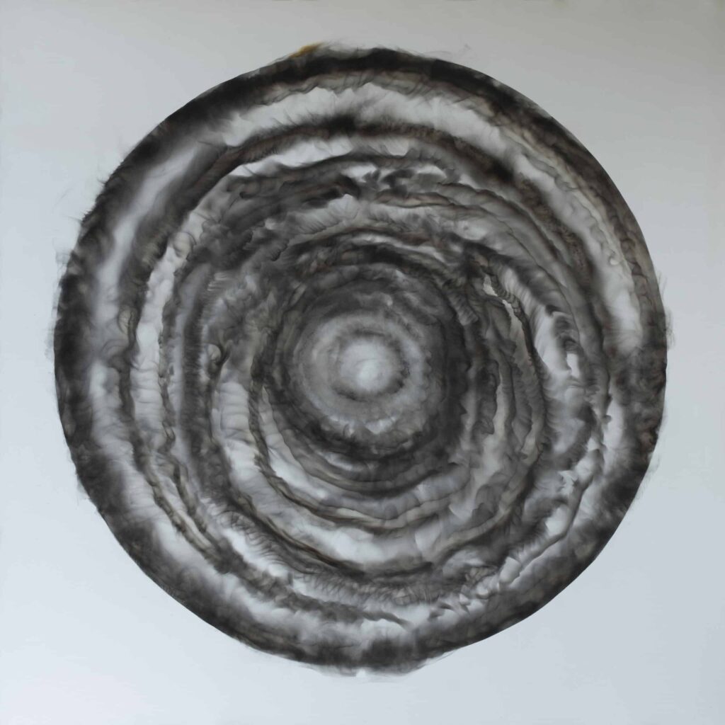Painting showing the revolutionary art techniques of Miguel Hernandez Bastos, featuring a large circle painted in smoke on canvas. Called circle of time