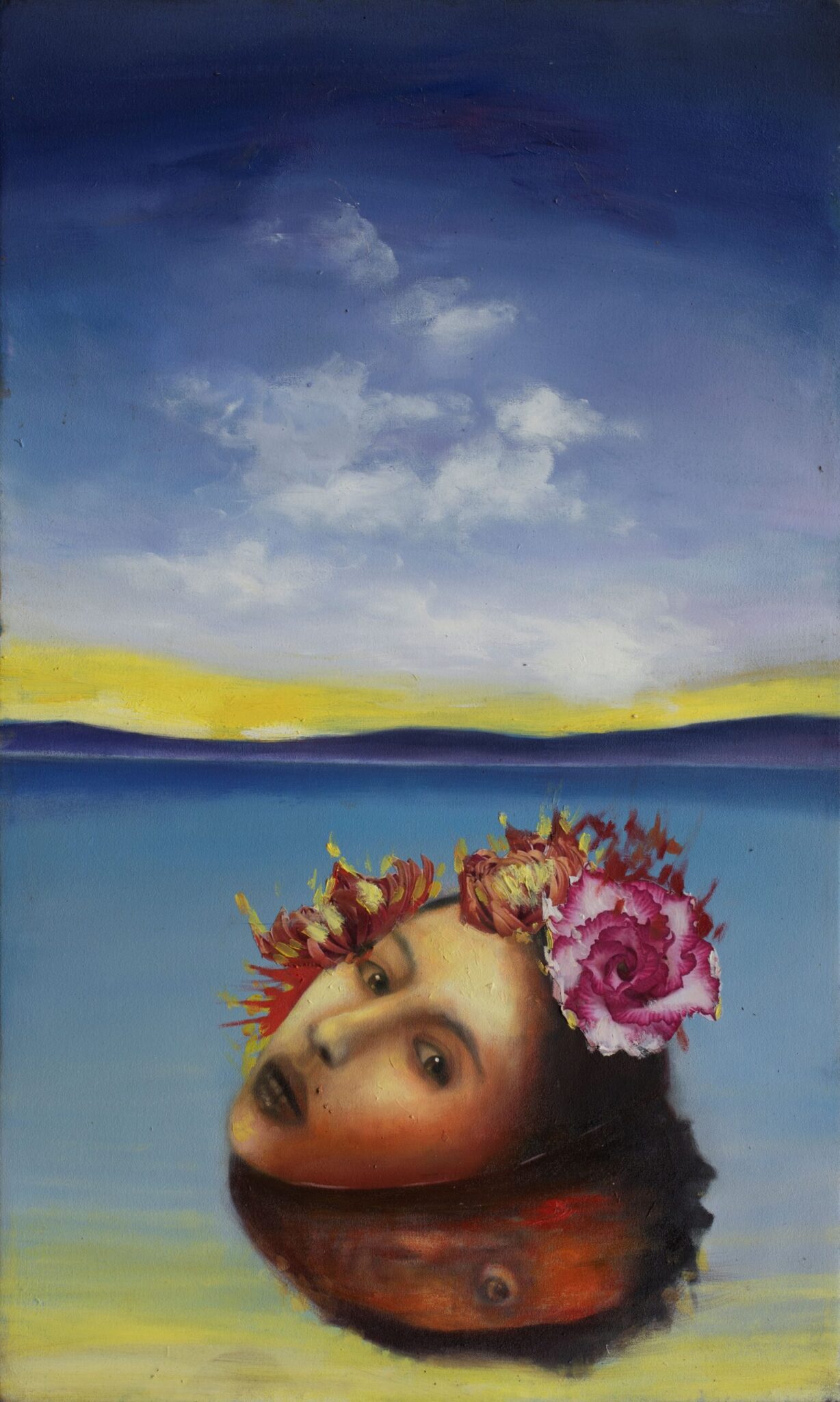 Floración by Pablo Mejias, featuring a surreal blue and yellow landscape and a body of water, out of which emerges a female head with flowers on her head. Lurking underneath is the face of a devil, suggesting drowning in your subconscious.