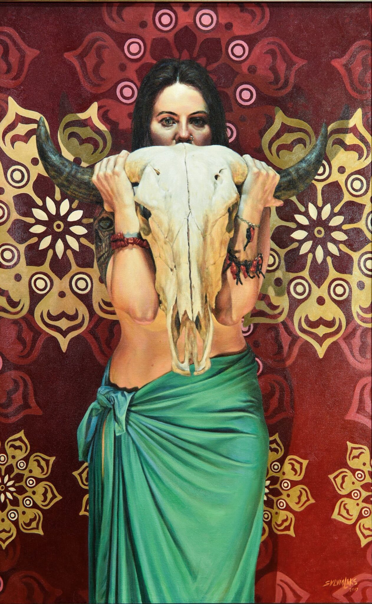 An example of Sylvia Laks' witch portraits, Bruja 2. This painting depicts a half-naked witch holding the skull of a cow. It's unsettling, but also sensual and otherworldly.
