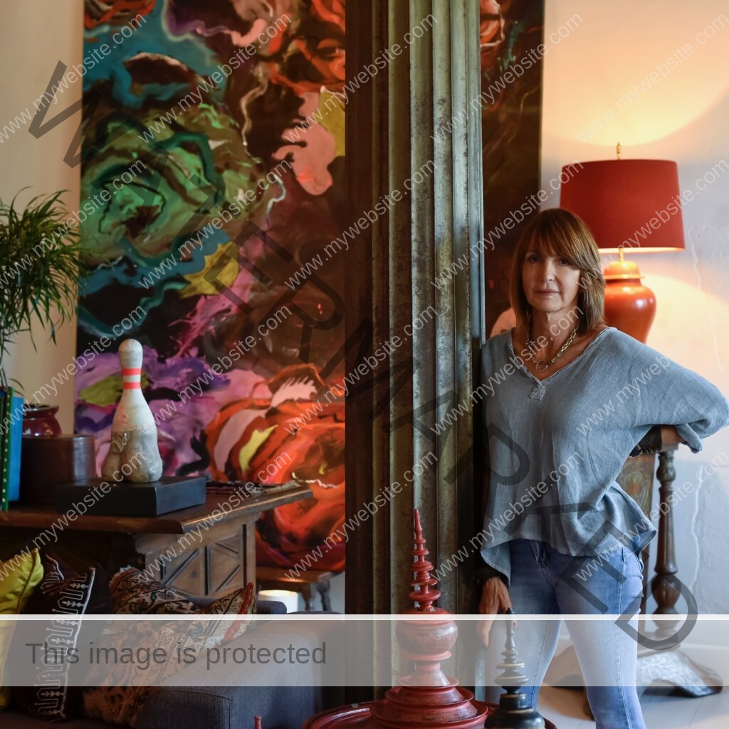 Portrait of artist Aimée Joaristi in her home. Referencing her Cuban roots.