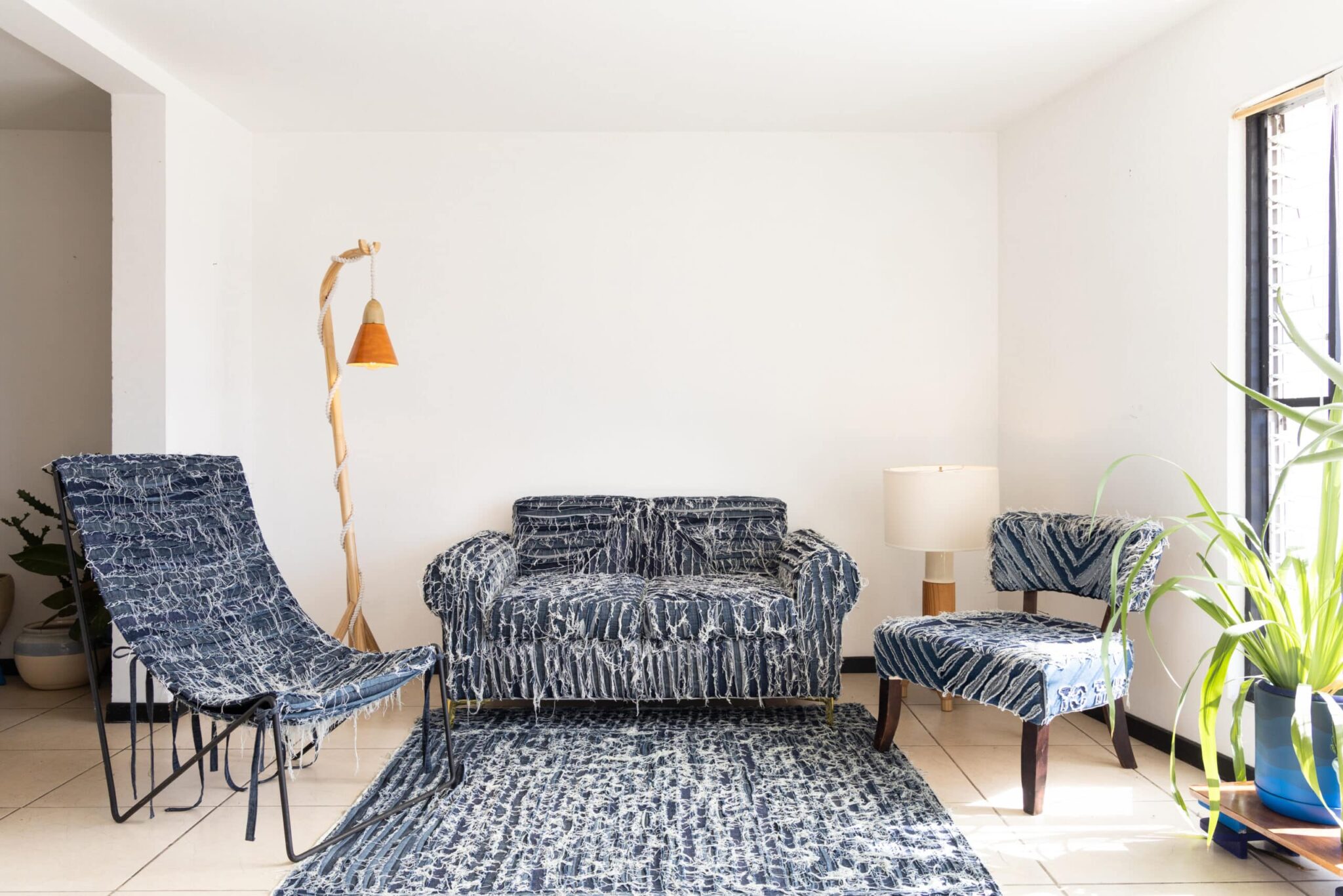 Denim couch and rug duo by the fashion designer, Oscar Ruiz-Schmidt.