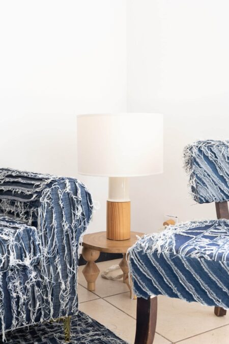 A ceramic and pine wood table lamp by the Costa Rican fashion designer, Oscar Ruiz-Schmidt.