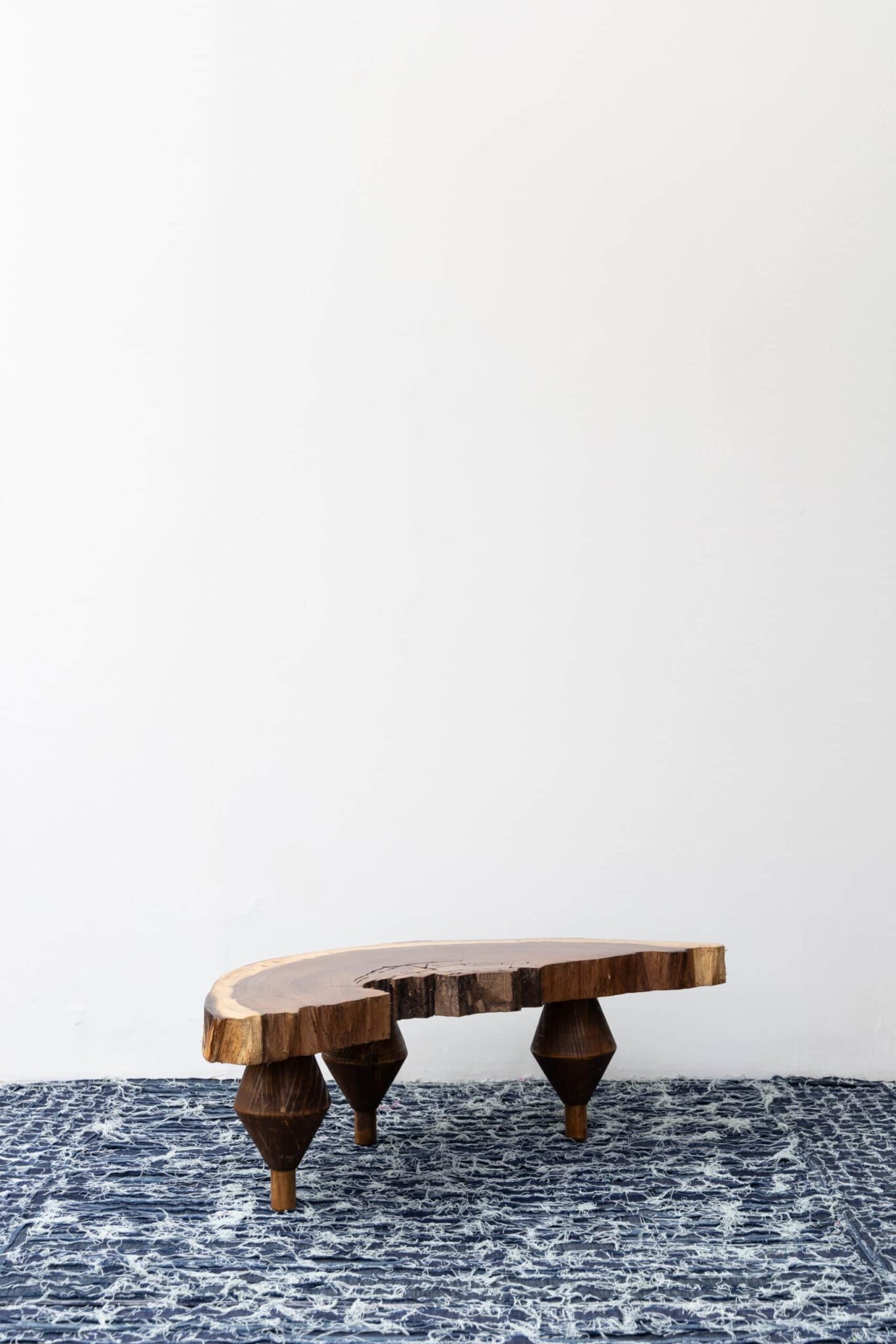The Olimpia table features a live-edge top and three sculptural legs, crowned by an Art Deco vase that accentuates its artistry. , an original work available at MÍRAME Fine Art.