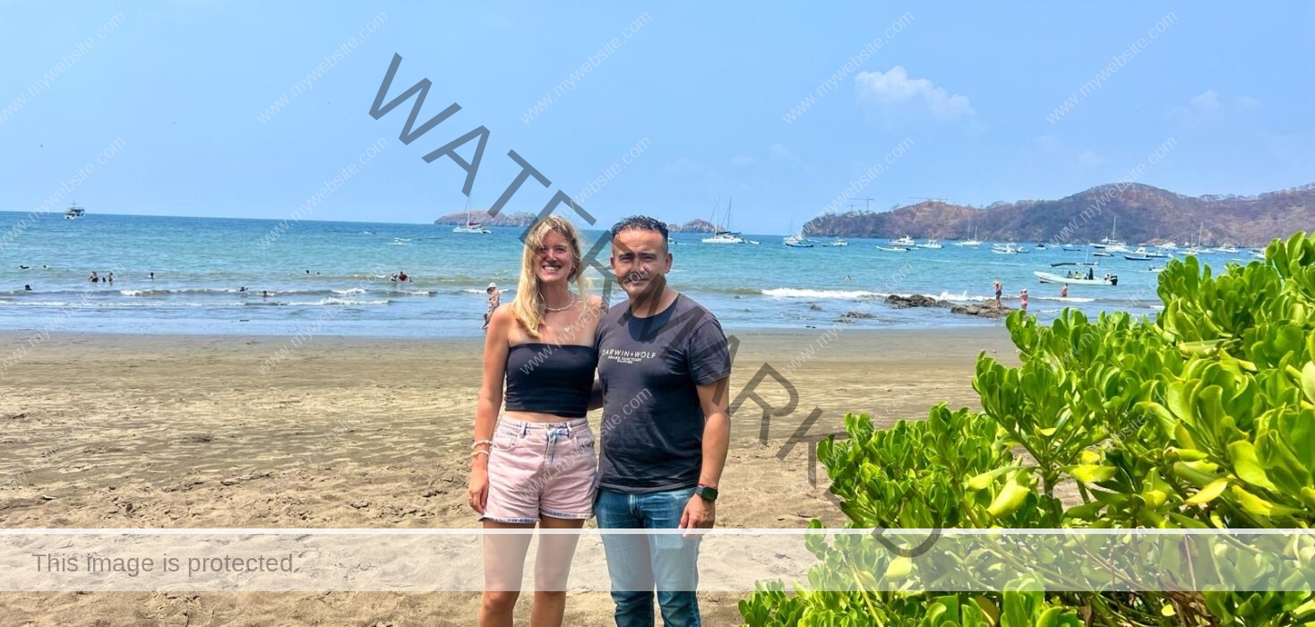 Photograph of Belinda Seppings and wildlife photographer Edwar Herreno on Playas del Coco beach, Costa Rica