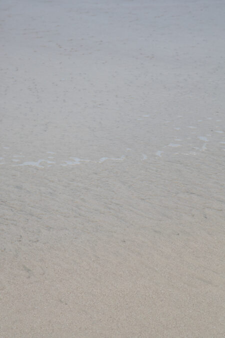 abstract ocean photography of sand under ocean water, by Juan Tribaldos.