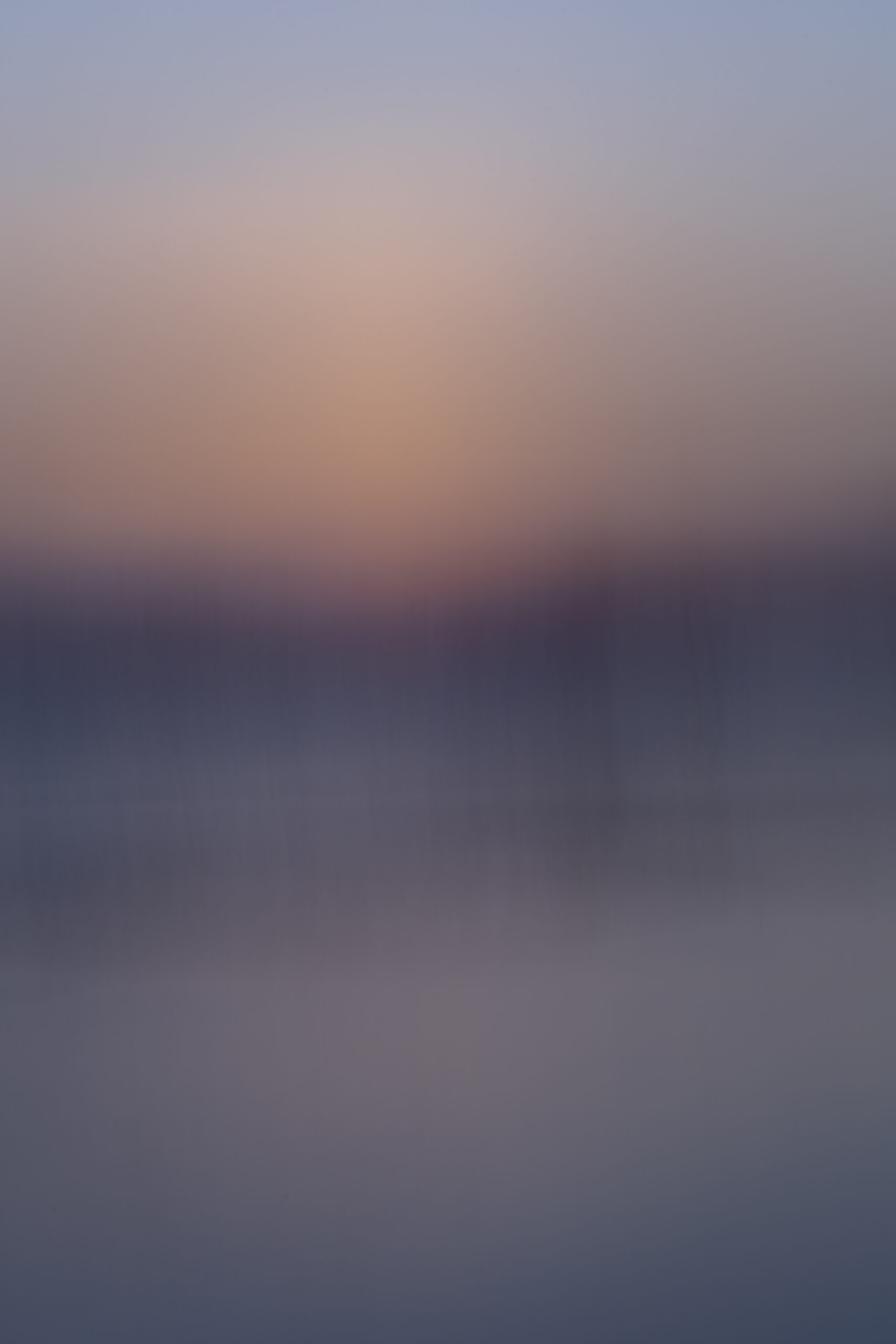 Costa Rica abstract photography by Juan Tribaldos where he has blurred the image of an ocean and soft light of either a sunrise or a sunset into complete dreamy abstraction.