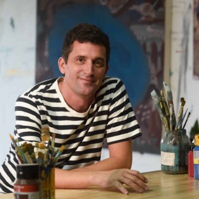 Portrait of the artist Fabian Monge, in his studio.