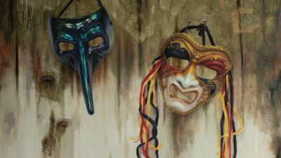 Costa Rican art. Plague and circus painting by Sylvia Laks. Two discarded masks appear anguished and suffering, evoking feelings of isolation and suffering.
