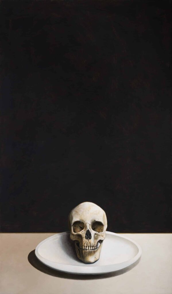 Skull painting by Eliecer Rodriguez featuring a skull on a plate, on a table with a stark black background. Menacing and macabre, the acrylic on canvas is unsettling.