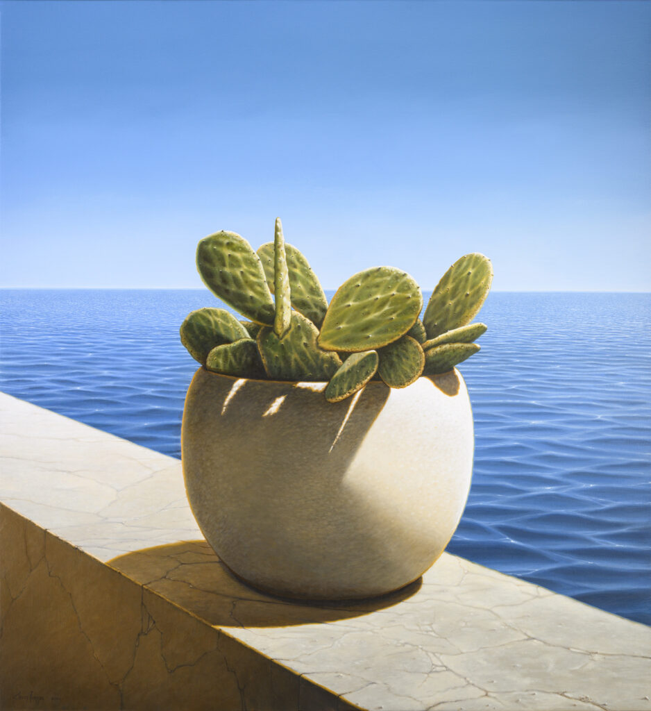 A hyperreal cactus painting by Costa Rican hyperrealist artist Eliecer Rodriguez featuring a potted cactus sitting on a ledge with the expanse of the ocean in the background.