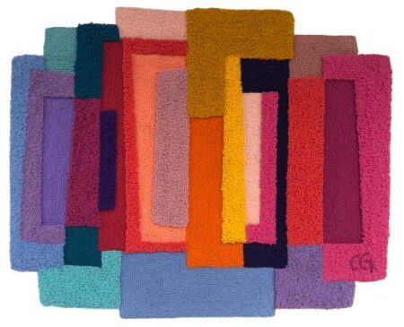 Carolina Guillermet's new tapestries. A woven tapestry with geometric shapes in pastel colours.