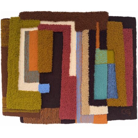 Carolina Guillermet's new tapestries. A woven tapestry with geometric shapes in brown and ochre hues.