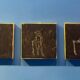 Centro Cultural de España - three small black canvases with figures painted.