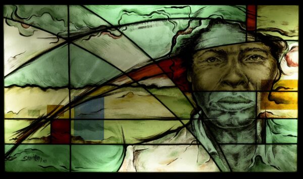 green, yellow and red stained glass figure