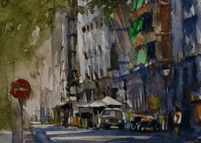 Latin American watercolour artist Juan Carlos Camacho’s painting showing a shaded street with green shutters, white umbrellas, and a red stop sign