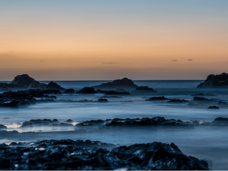 Photographu of a misty ocean sunrise on the pacific coast. Costa Rica photography by Julio Sequeira.