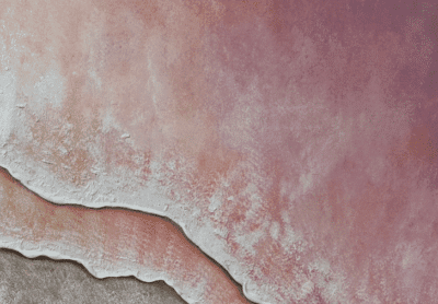 An exquisite aerial of Zarpe Playas del Coco, where soft pinks, oranges, and purples blur elegantly into the shoreline’s serene contours. , an original work available at MÍRAME Fine Art.