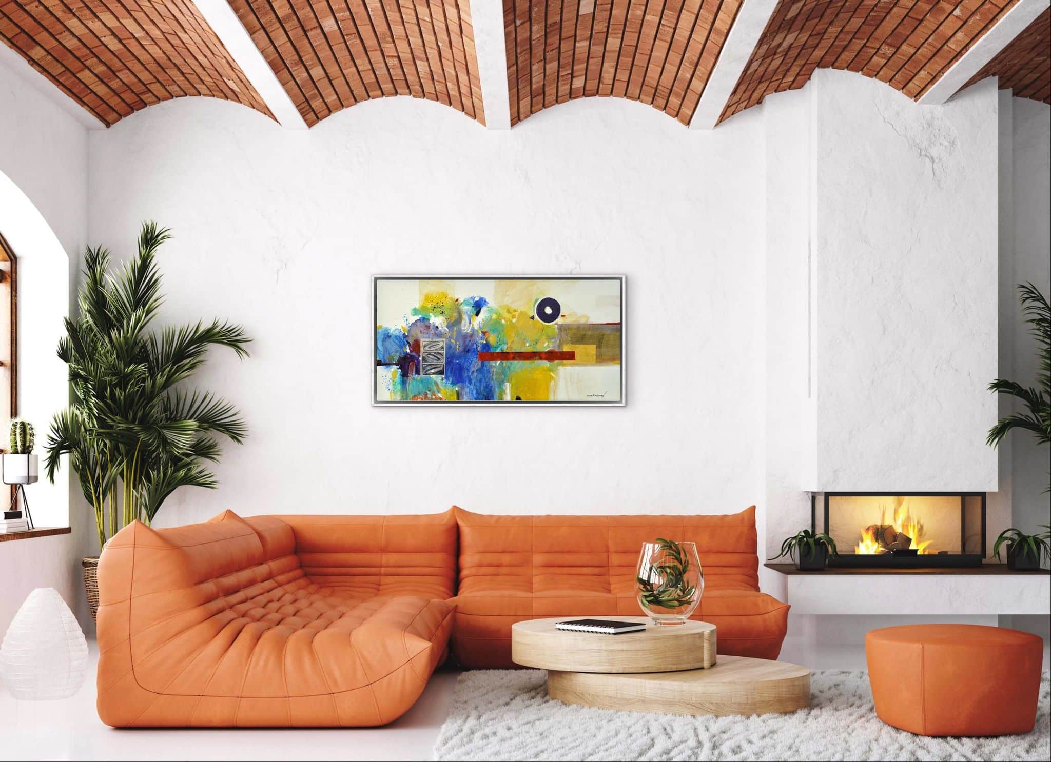 In a refined interior of white walls and undulating brick ceilings, the abstract "Montaña" crowns an orange sofa with vibrant energy. , an original work available at MÍRAME Fine Art.