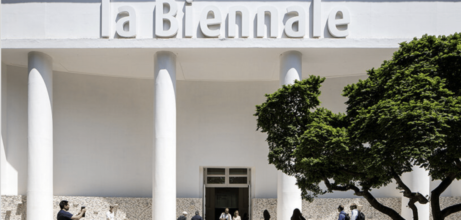 Visitors gather before a neoclassical building marked "Venice Biennale 2026," framed by verdant tree and serene reflecting pool. , an original work available at MÍRAME Fine Art.