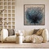 This space presents the EMDR II by Alessandra Sequeira. Textured beige sofa, elegantly paired with neutral accents, framed by abstract art and geometric walls. An original work available at MÍRAME Fine Art.