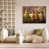 In a refined modern living room, “Still Life” with vivid abstract bottles graces the textured wall above an elegant cream sofa. , an original work available at MÍRAME Fine Art.